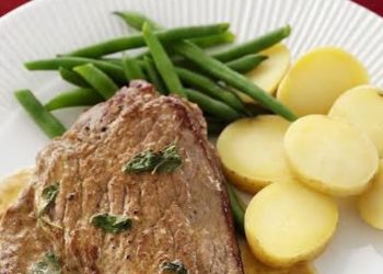 Knoblauchbuttersteak und grüne Zitronenbohnen-Pfanne